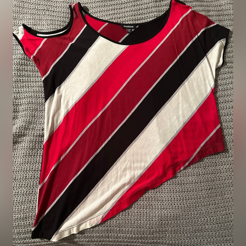 Asymmetrical Bebe rayon knit blouse